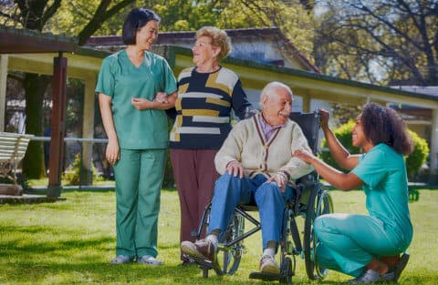 caregivers and elderlies chatting